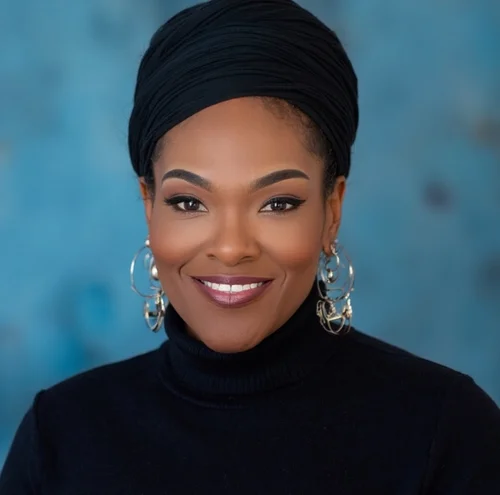 Naaila Moumaris smiling in a professional founder portrait